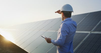 How does building solar at my business impact commercial electricity rates?